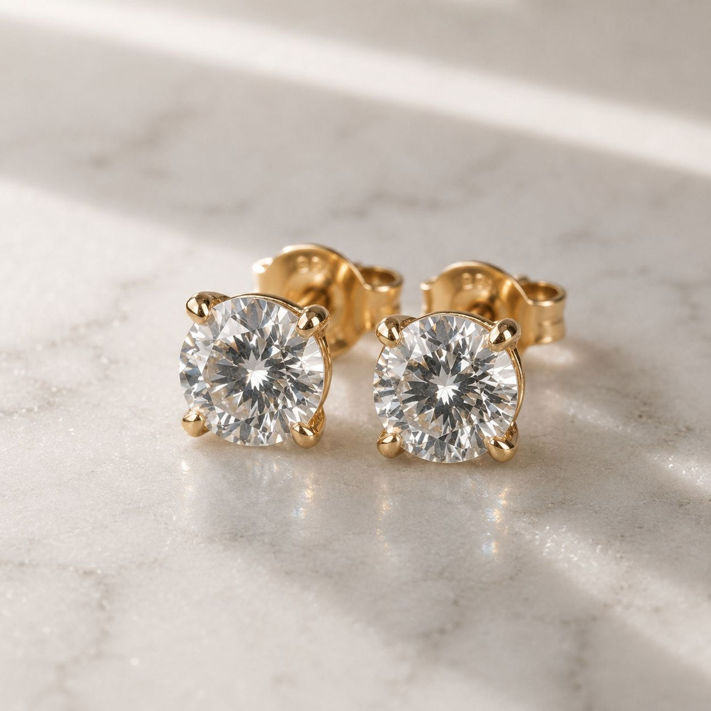 Four-Prong Studs, shown in 14K Yellow, Round