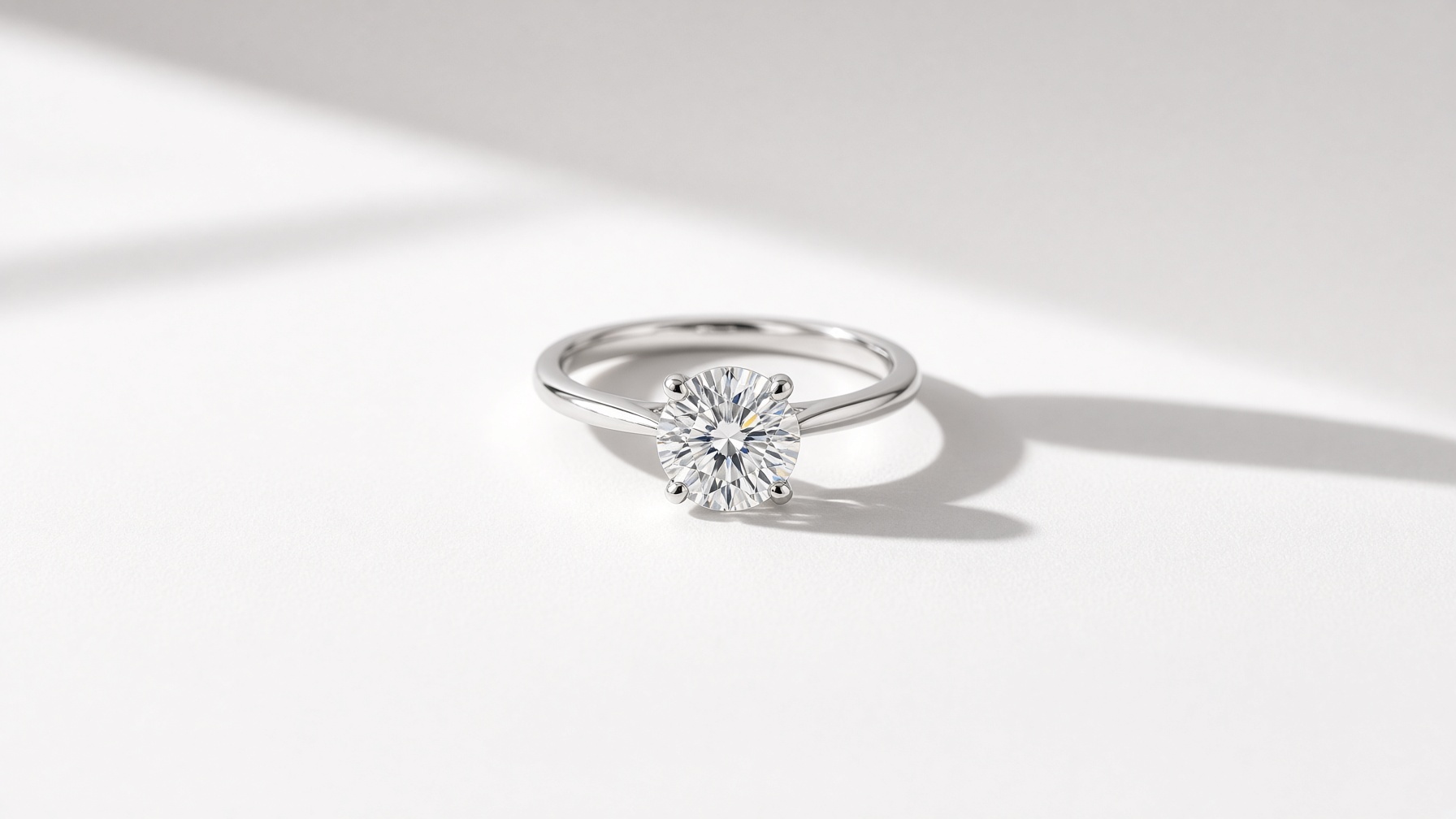 A round brilliant in platinum on white